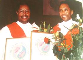 Professor Aklilu Lemma (right) who discovered the molluscicidal property of Phytolacca dodecandra and his research associates Professor Legesse Wolde-Yohannes (left) 
